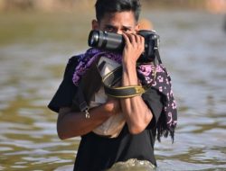 Dari Lensa Dimas, Tarian Togak Luan Pacu Jalur Kuansing Mendunia