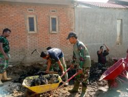 Bahu-Membahu Melawan Sisa Banjir: Saat Loreng dan Warga Bersatu Menghidupkan Nadi Desa