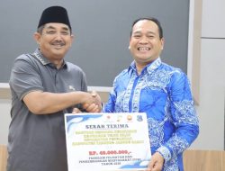 Bupati Tanjab Barat Serahkan Bantuan PetroChina kepada Korban Kebakaran Teluk Nilau